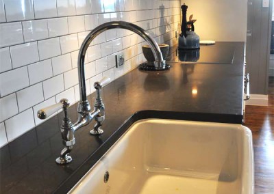 20mm Caesarstone Piatra Grey Kitchen with 40mm Pencil Round Edge showing Undermount Butler Sink