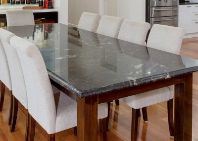 30mm Black Forest Gold Granite Dining Table with Lambs Tongue Edge